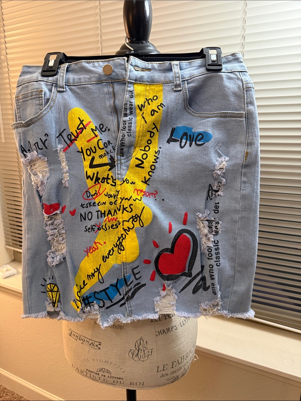 Light Blue Graphic Denim Mini Skirt with Yellow & Red Accents